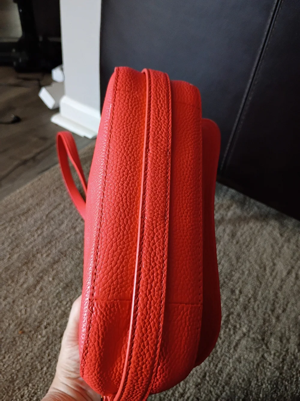 kate spade coral pebbled leather crossbody with tassel